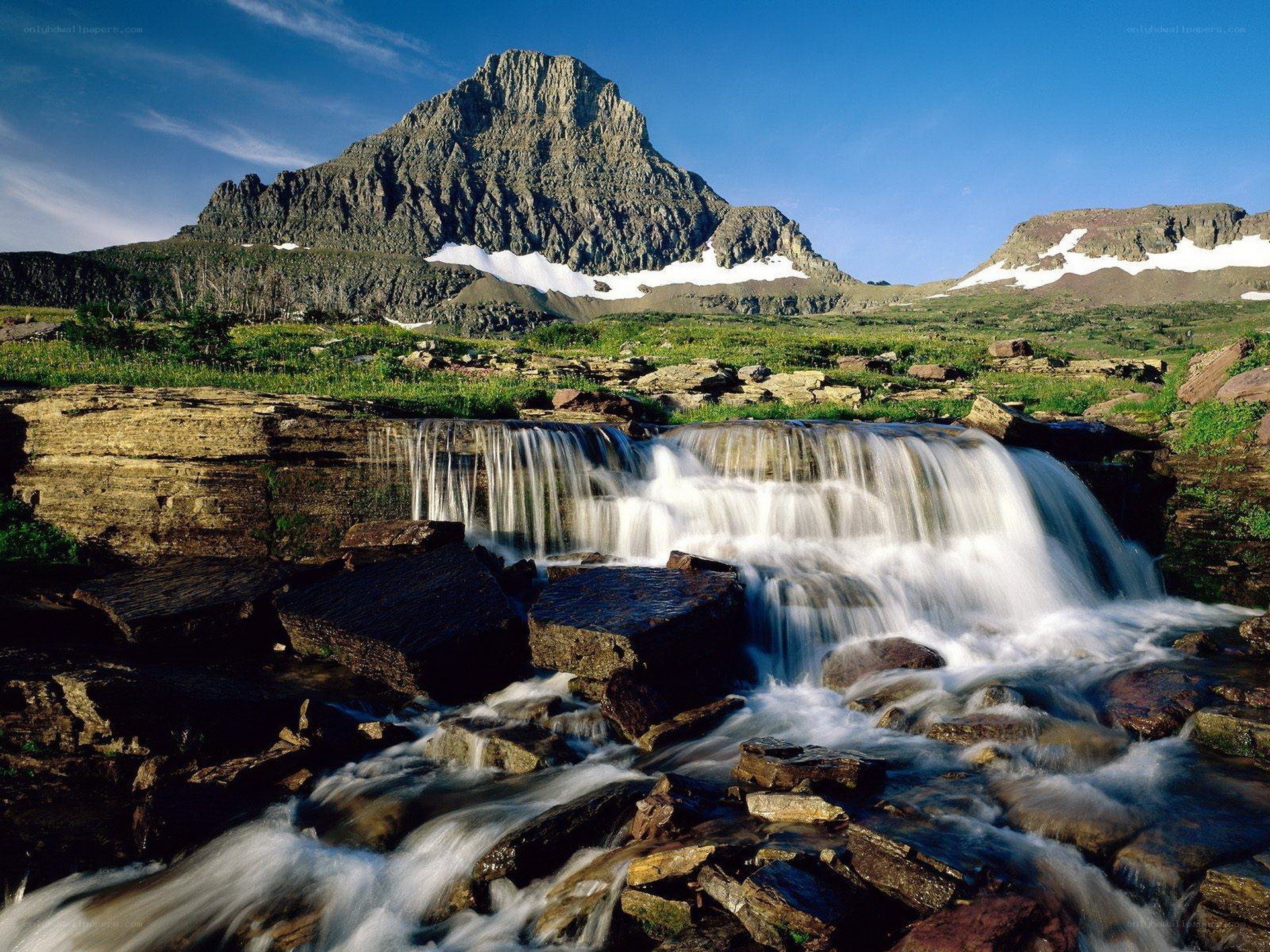 Waterfall in mountain valley
