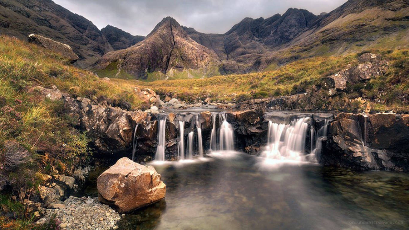 Waterfall in mountain valley