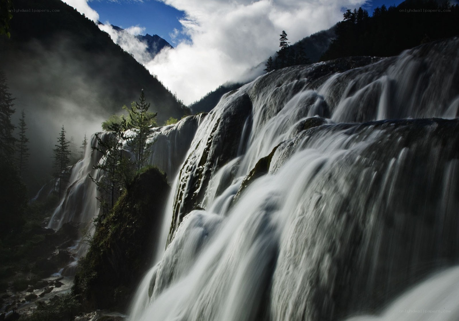 Waterfall in mountain valley