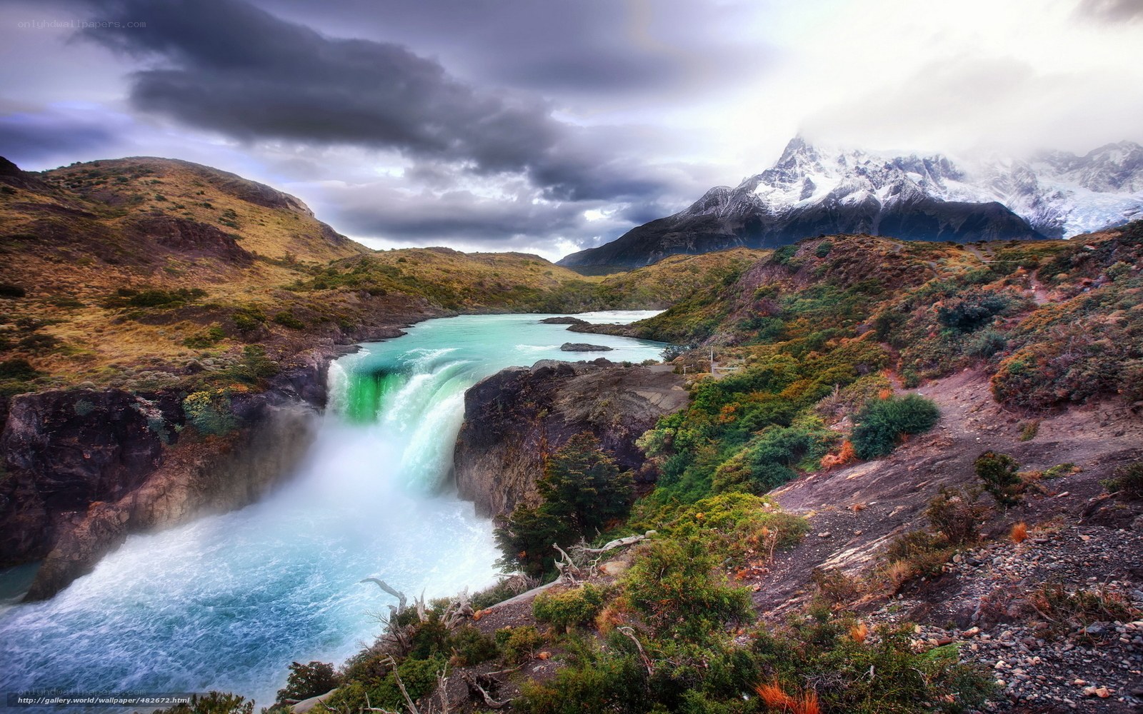 Waterfall in mountain valley