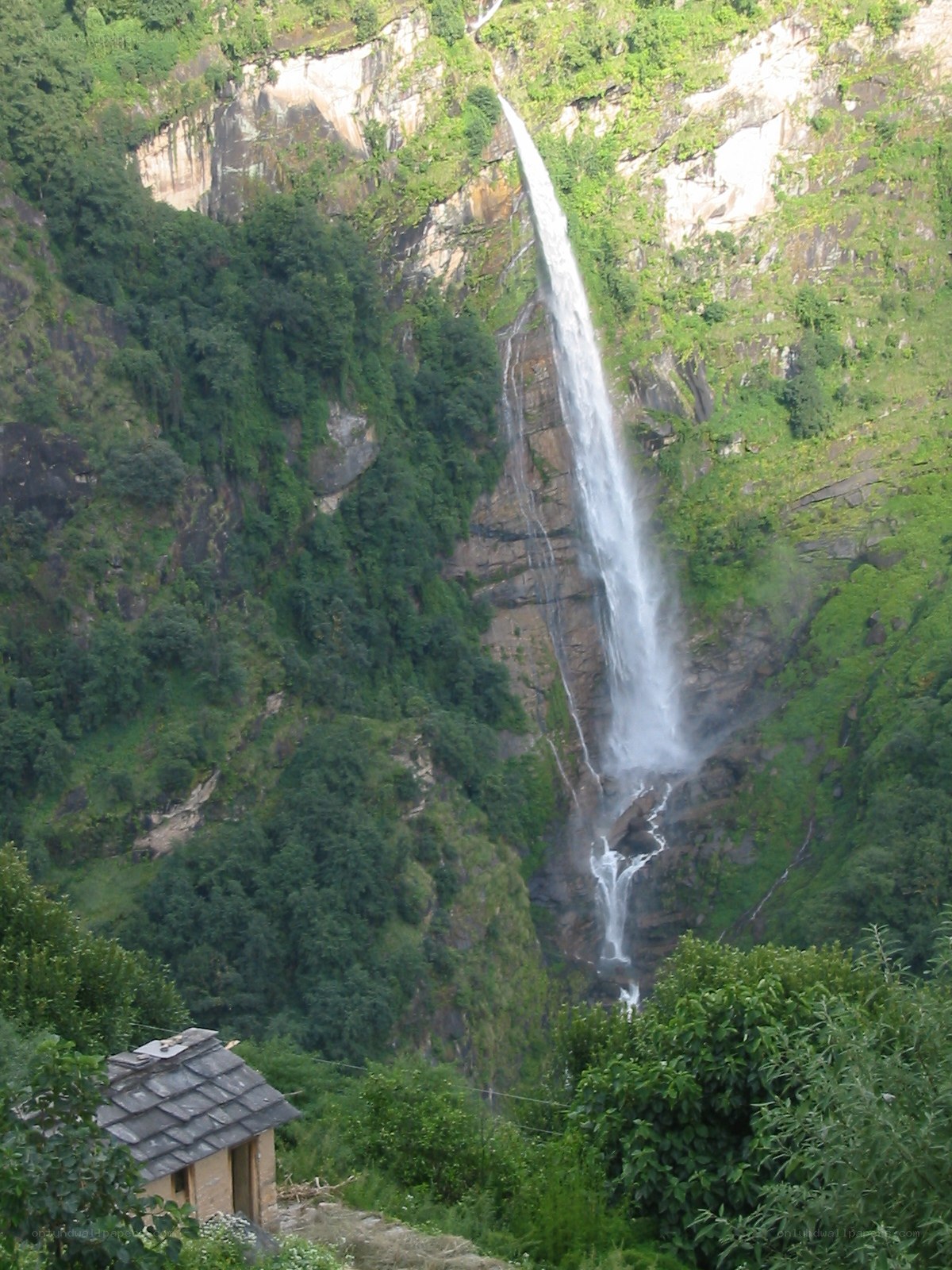 Waterfall in mountain valley