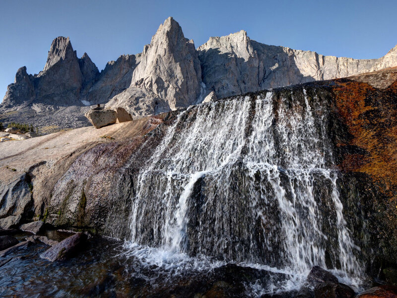 Waterfall in Mountain Valley — Blue, Serene, Afternoon, Photograph, Rock