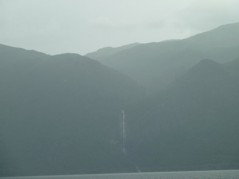 Waterfall in Mountain Valley — Green, Misty