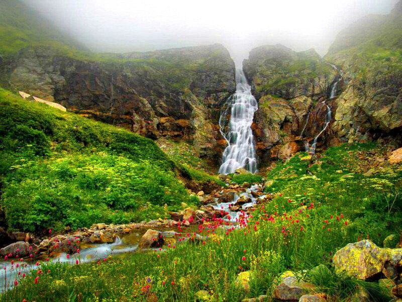Waterfall in Mountain Valley — Green, Serene, Spring