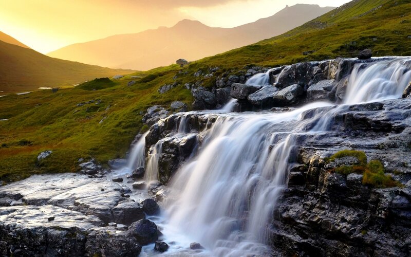 Waterfall in Mountain Valley — Green, Serene, Sunset, Photograph