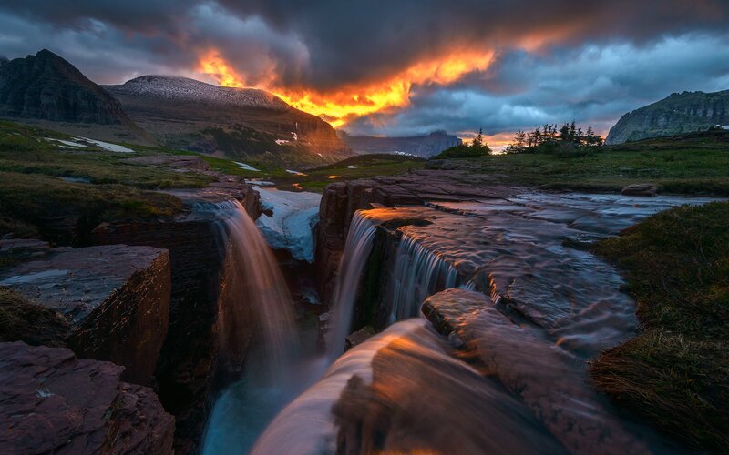 Waterfall in Mountain Valley — Orange, Dramatic