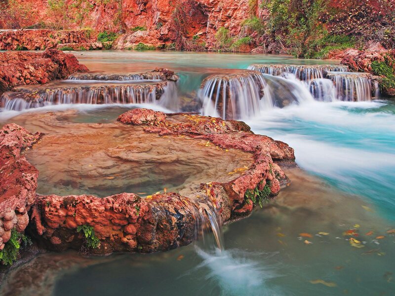 Waterfall in red rock canyon