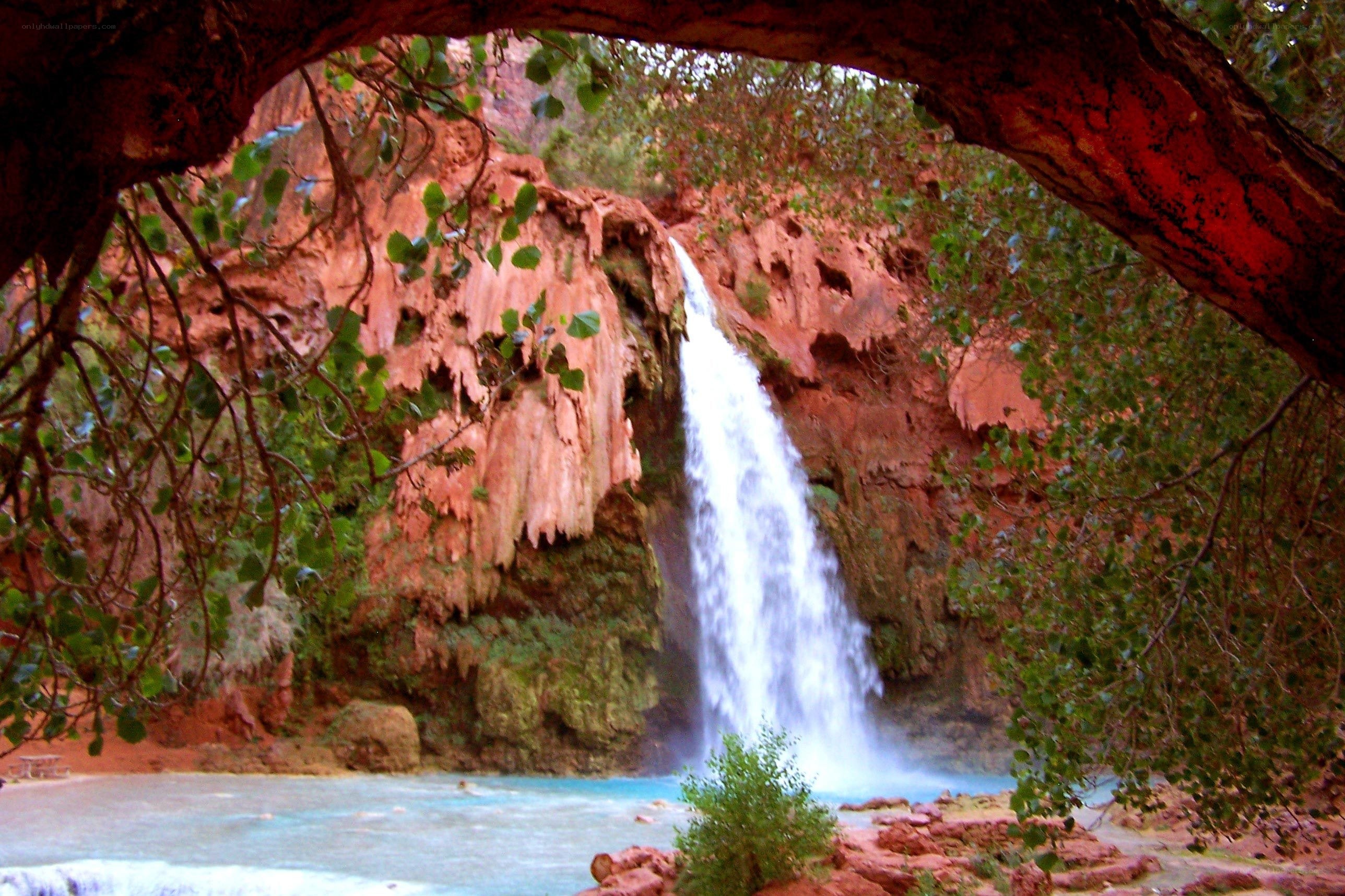 Waterfall in red rock canyon