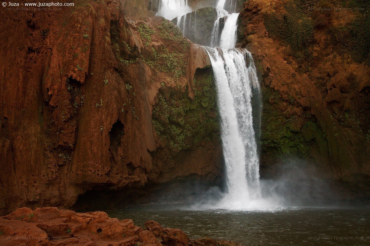 Waterfall in red rock canyon