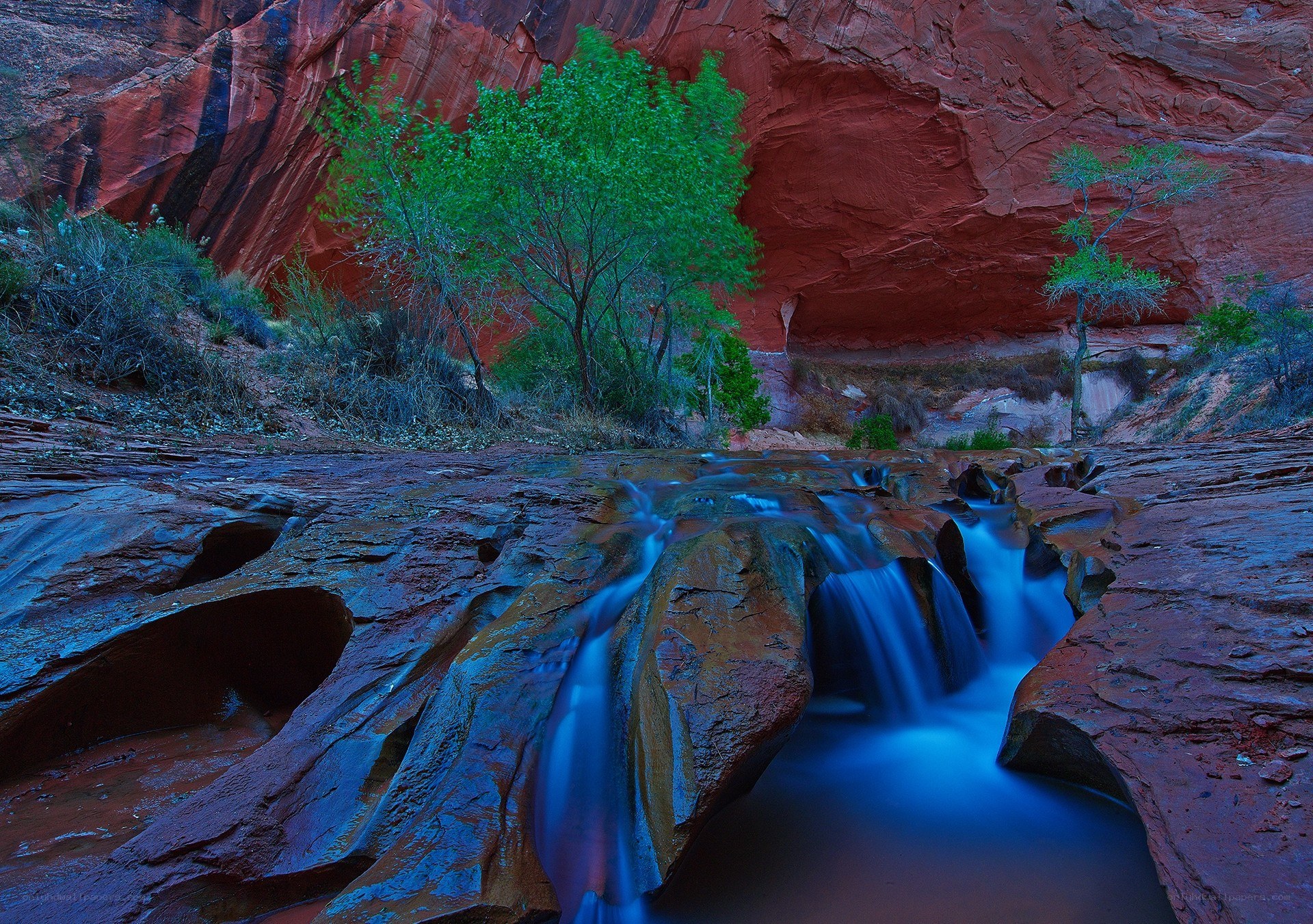 Waterfall in red rock canyon