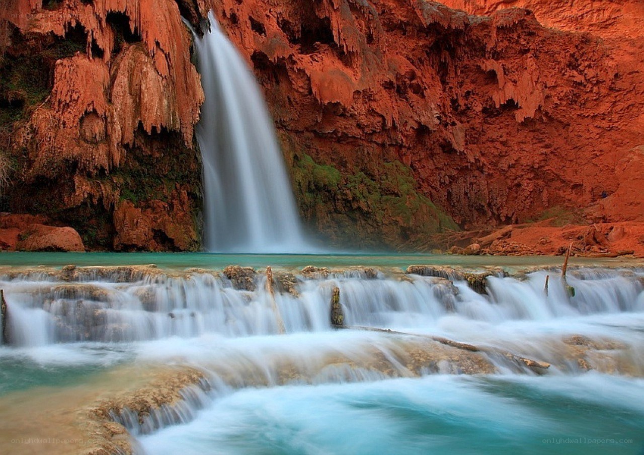 Waterfall in red rock canyon