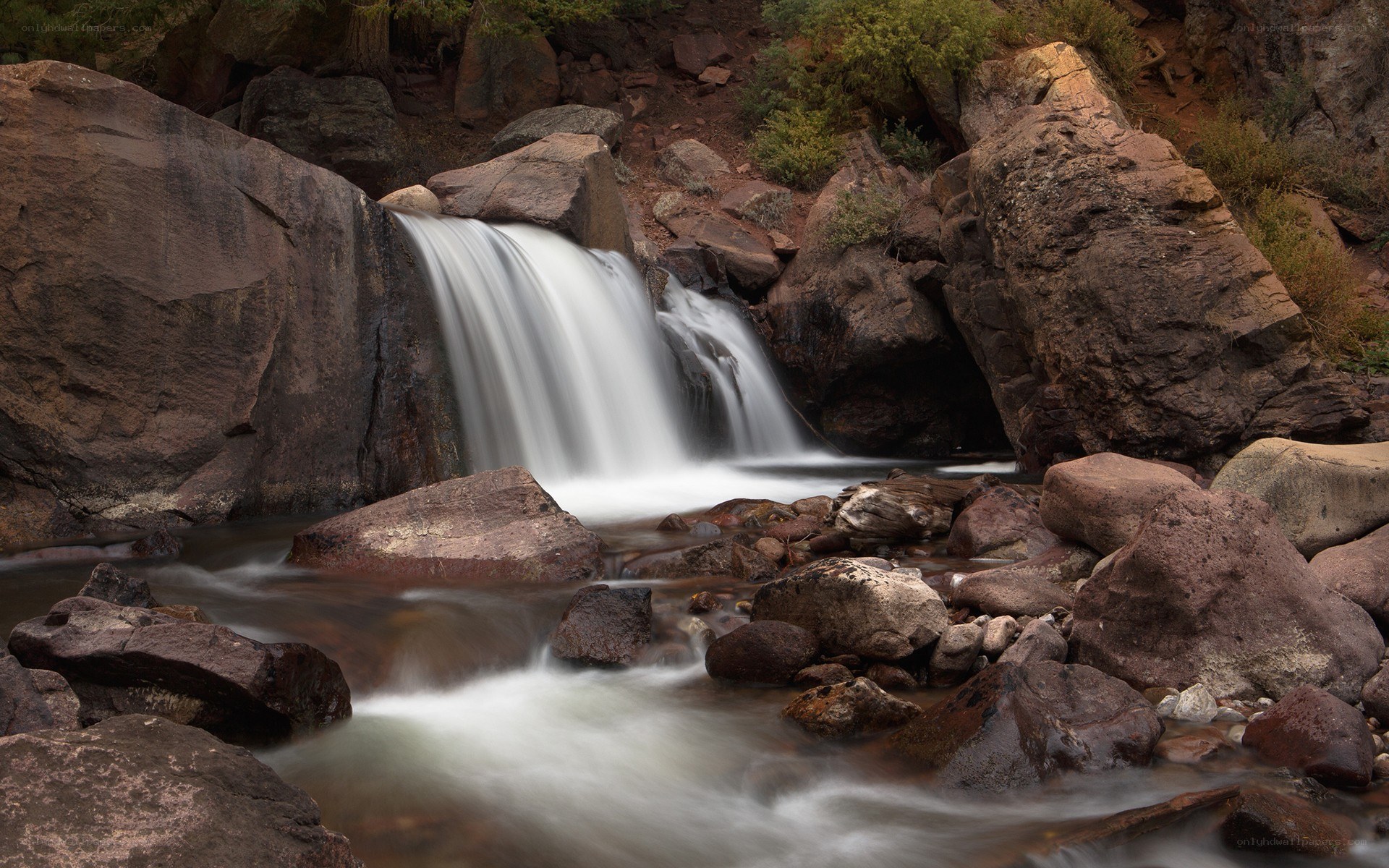 Waterfall in rocky canyon
