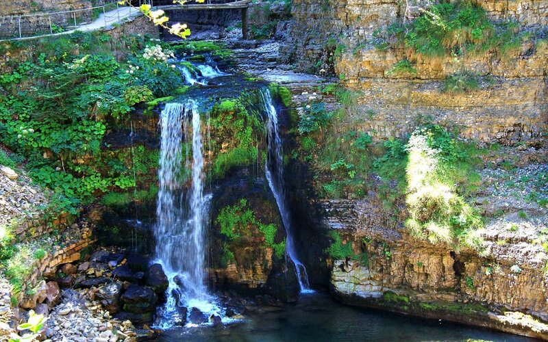 Waterfall in Rocky Canyon — Green, Serene, Afternoon, Photograph, River, Vegetation