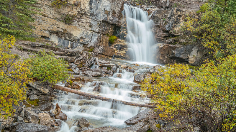 Waterfall in Rocky Canyon — Green, Serene, Autumn, Photograph