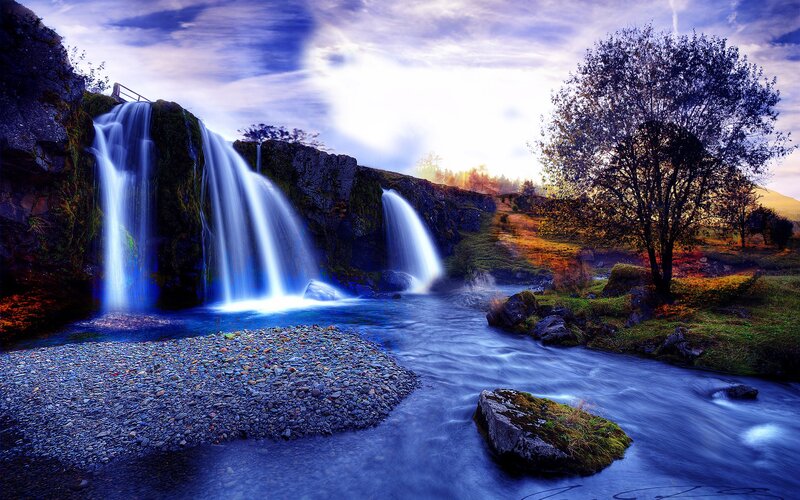Waterfall in Rocky Landscape — Blue, Serene