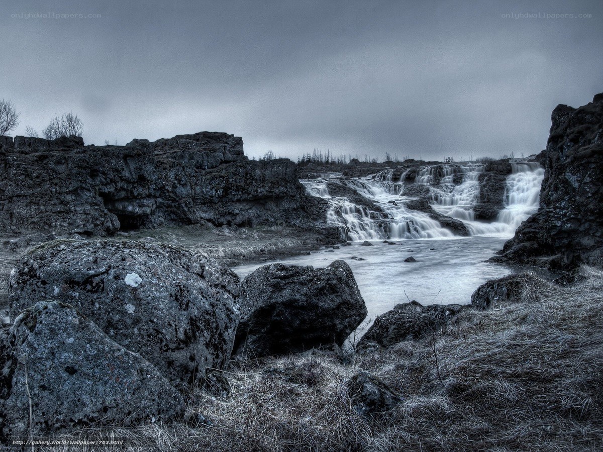 Waterfall in rocky landscape