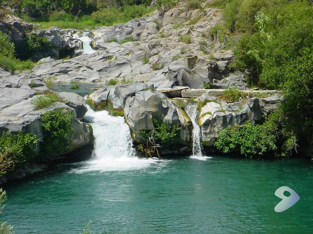Waterfall in rocky riverbed