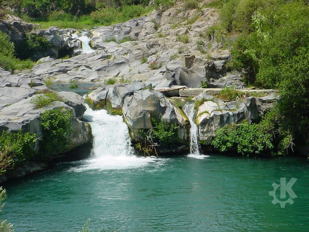 Waterfall in rocky riverbed
