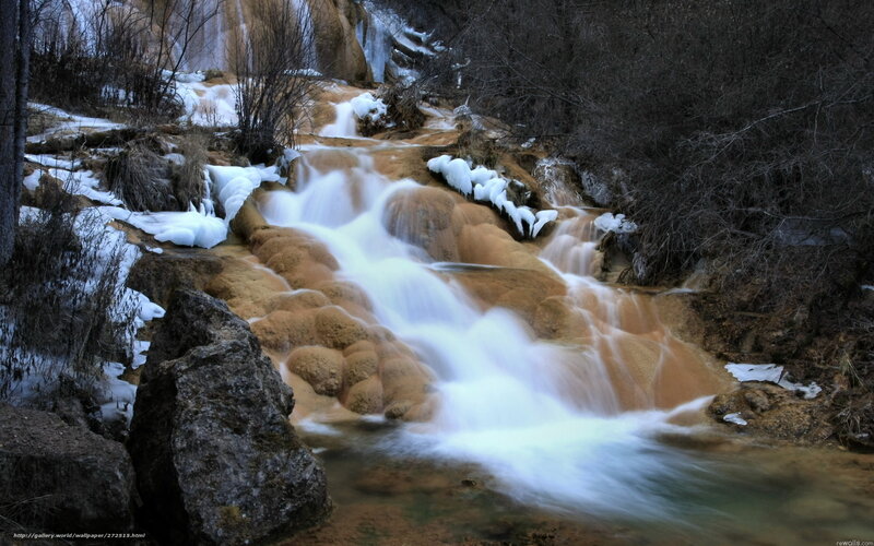 Waterfall in snowy landscape