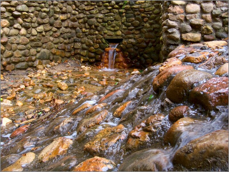 Waterfall in stone enclosure