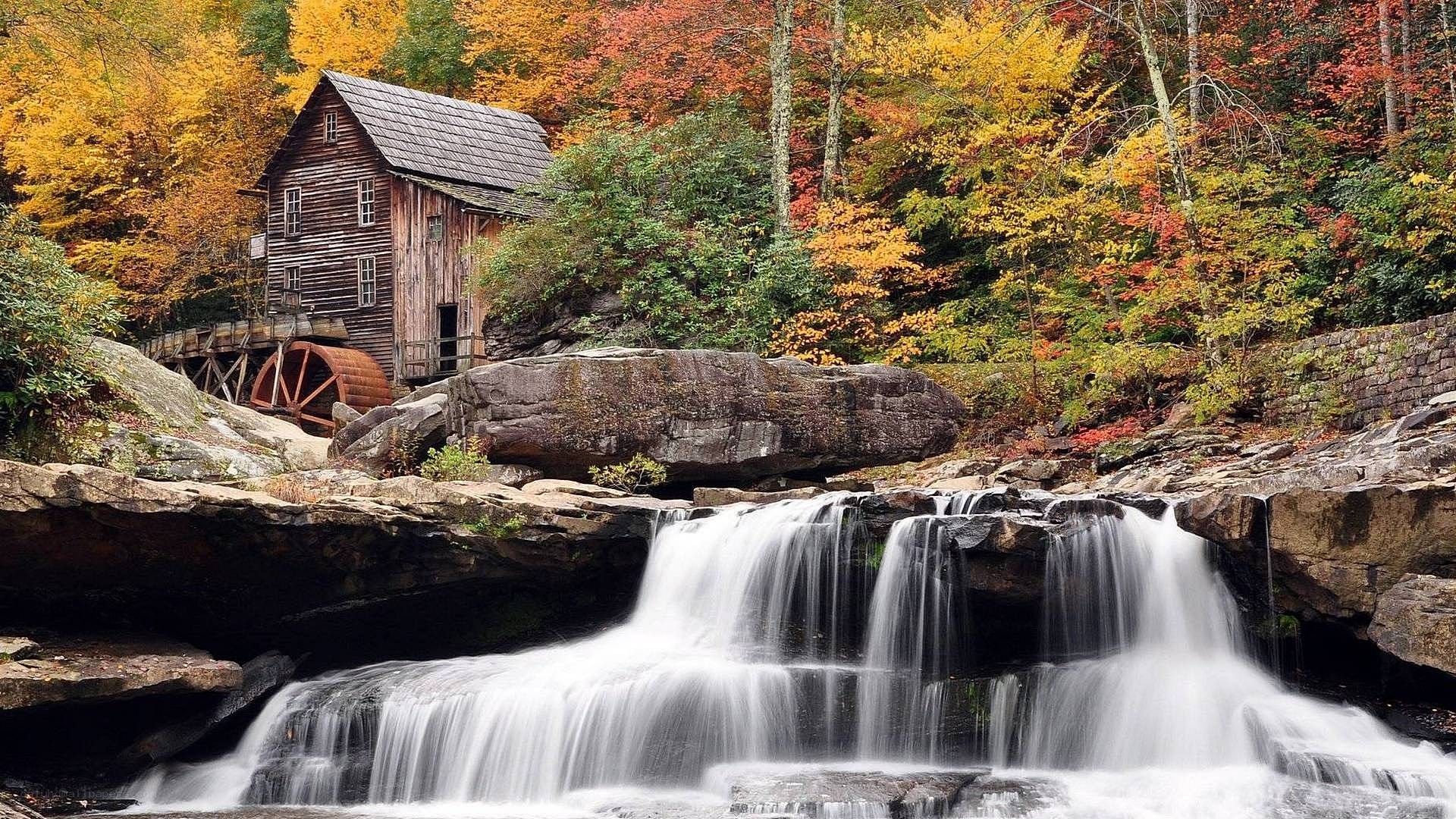 Waterfall mill in autumn