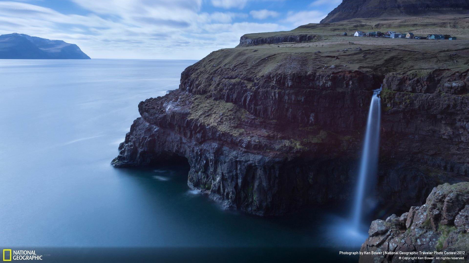Waterfall on a Faroe Islands cliff