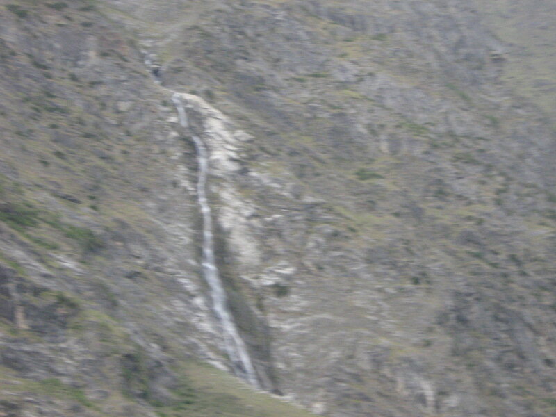 Waterfall on a rocky slope