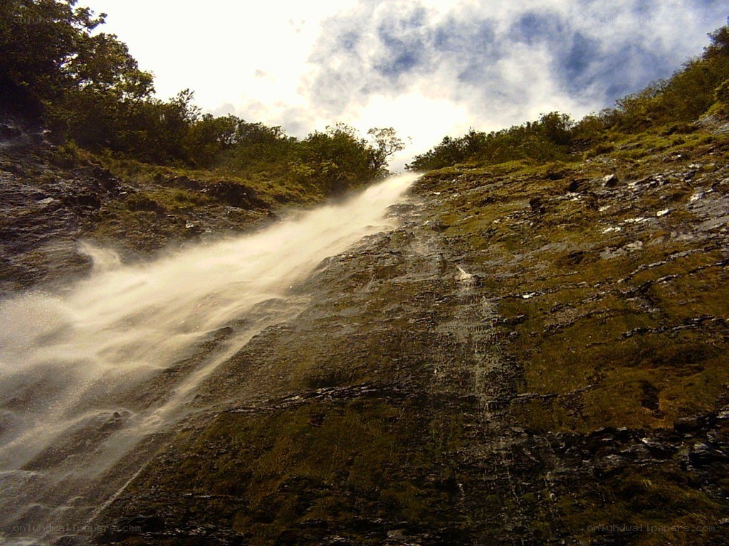 Waterfall on a rocky slope
