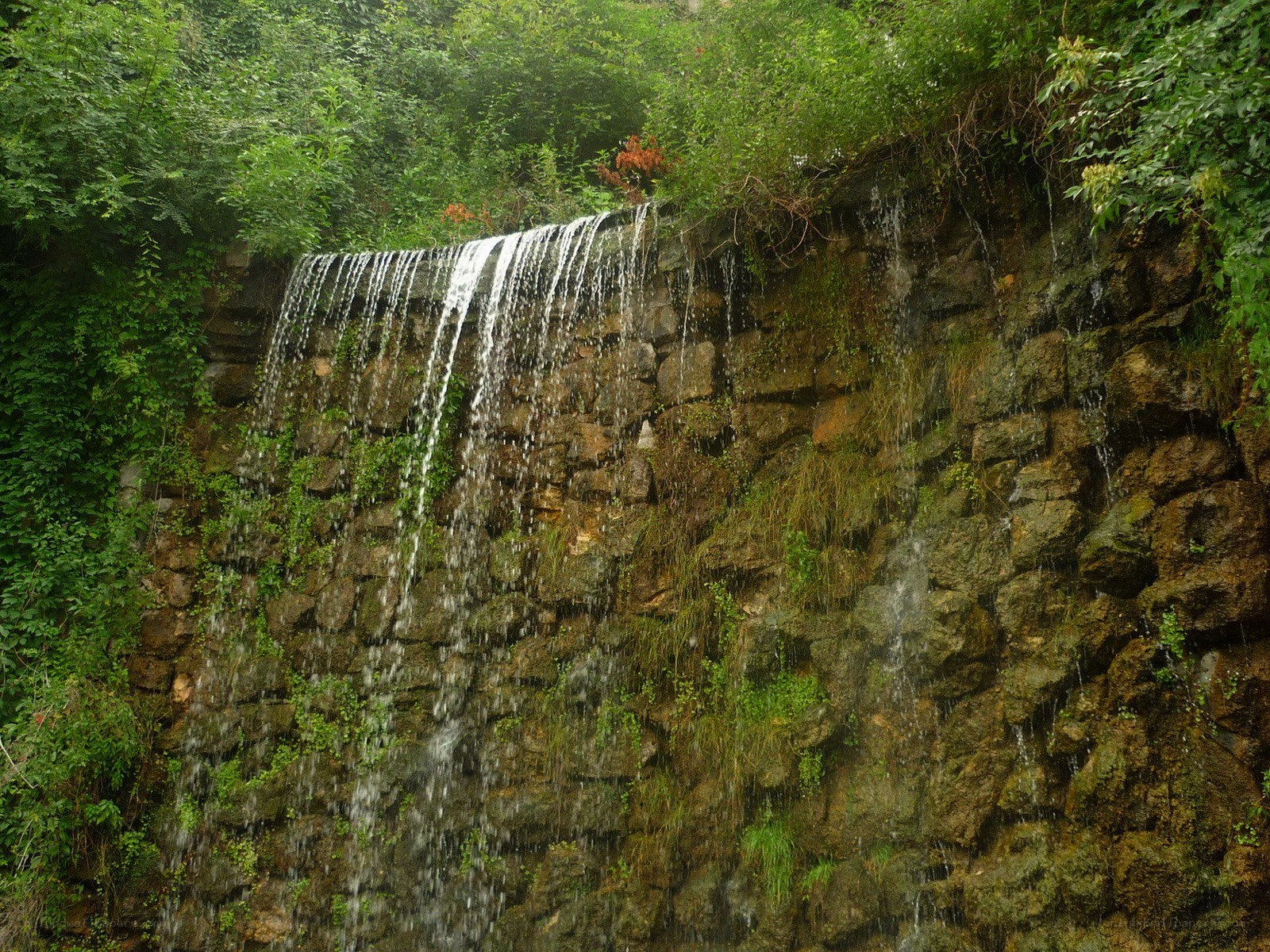 Waterfall on a stone wall