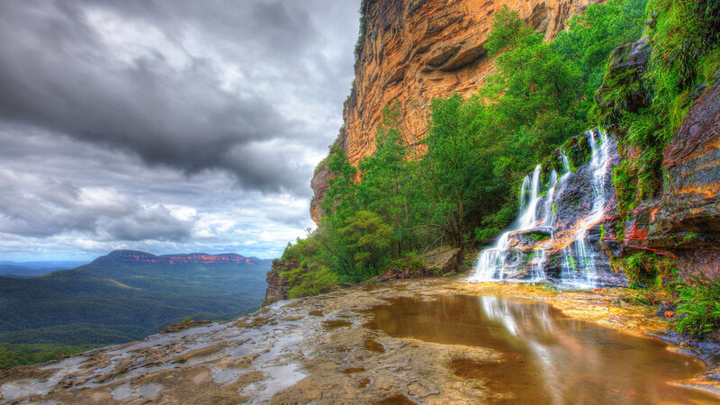Waterfall on Cliff Face — Green, Dramatic, Photograph
