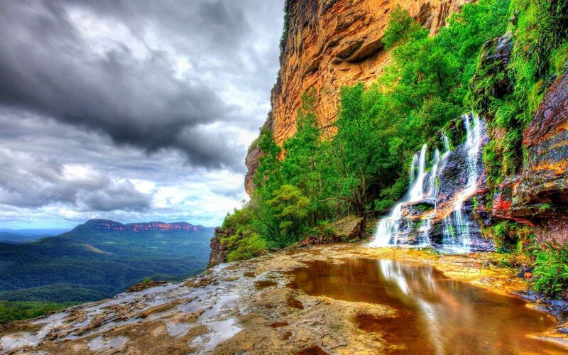 Waterfall on Cliff Face — Green, Dramatic, Photograph, Trees
