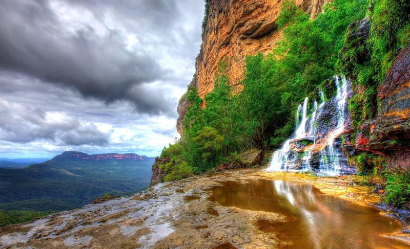 Waterfall on Cliff Face — Green