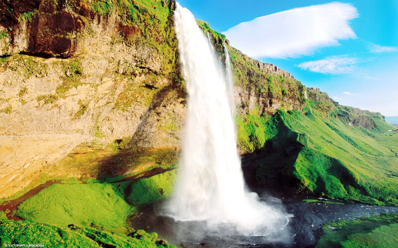 Waterfall on Green Cliff — Dramatic