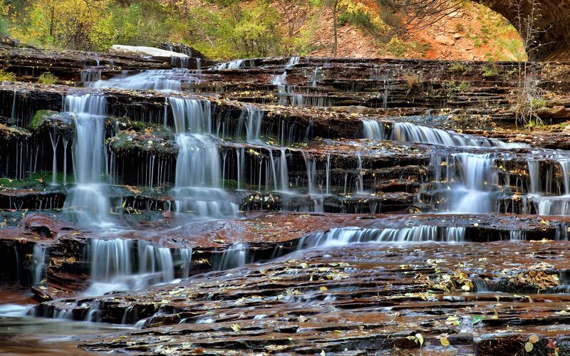 Waterfall on Layered Rocks — Brown