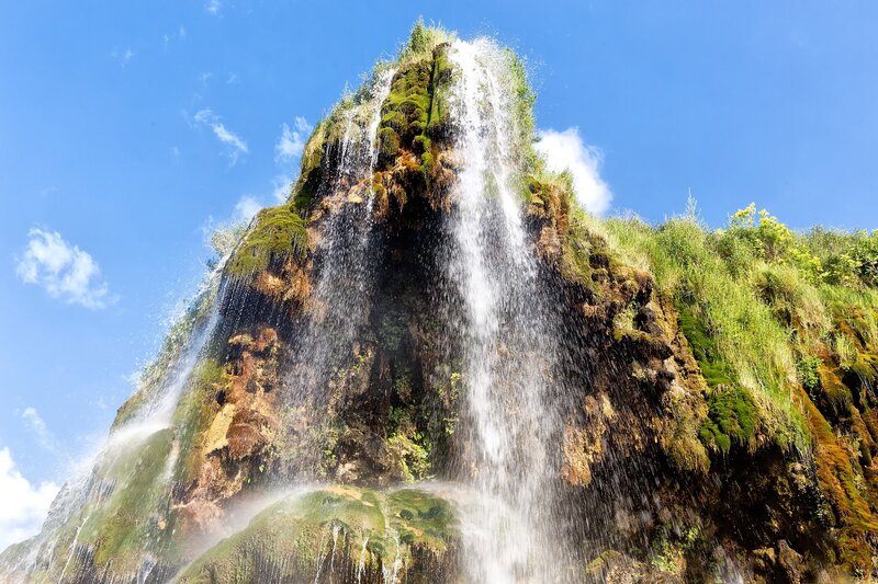 Waterfall on Mossy Cliff — Blue, Dramatic