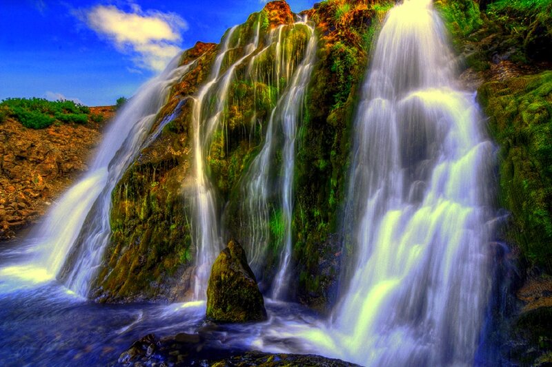 Waterfall on Mossy Cliff — Blue
