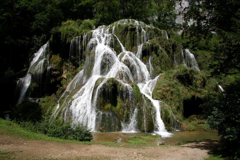 Waterfall on Mossy Rocks — Green, Serene, Afternoon