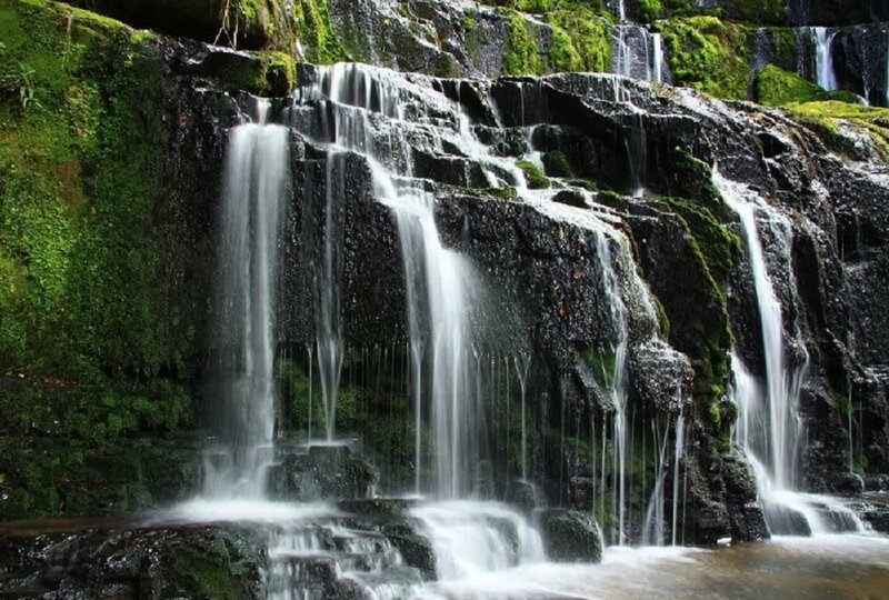 Waterfall on Mossy Rocks — Green, Serene, Photograph, Moss, Stream
