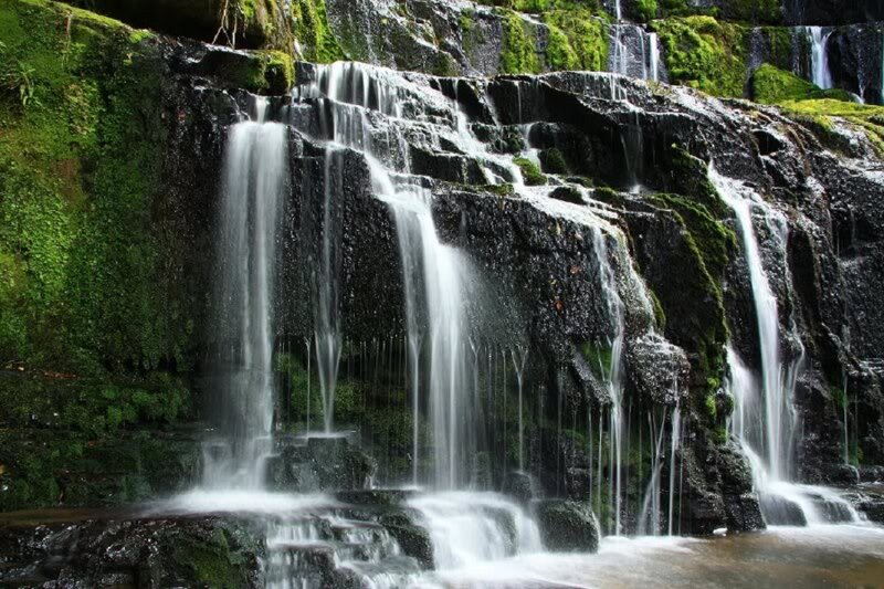 Waterfall on Mossy Rocks — Green, Serene, Photograph, Moss