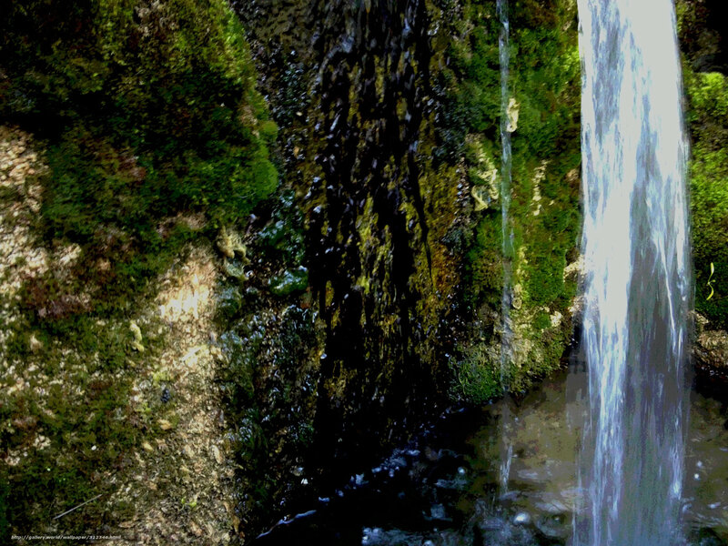 Waterfall on mossy rocks