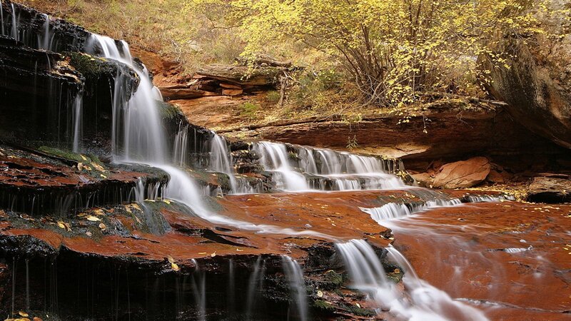 Waterfall on Red Rocks — Serene, Autumn