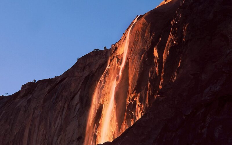 Waterfall on Rock Face — Blue, Dramatic, Sunset, Photograph