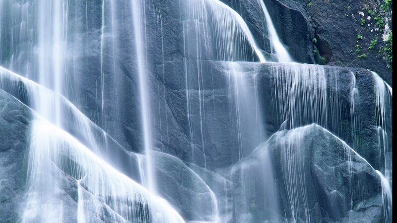 Waterfall on Rock Face — Blue, Serene