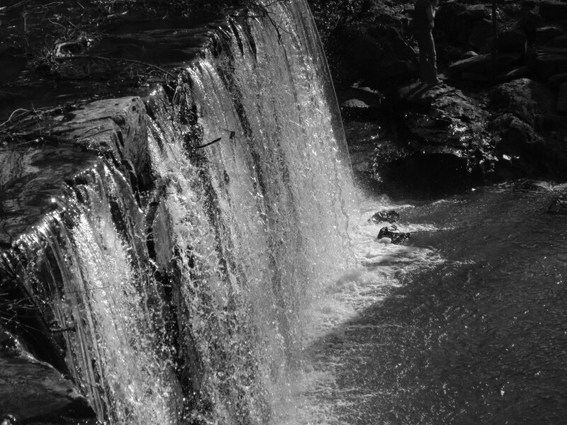 Waterfall on Rocks — Black