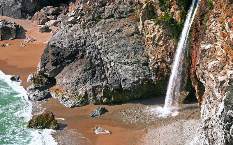 Waterfall on Rocky Beach — Brown, Dramatic, Afternoon, Photograph, Ocean, Sand