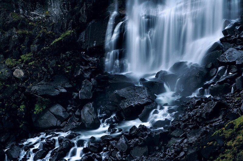 Waterfall on Rocky Cliff — Black, Dramatic, Photograph
