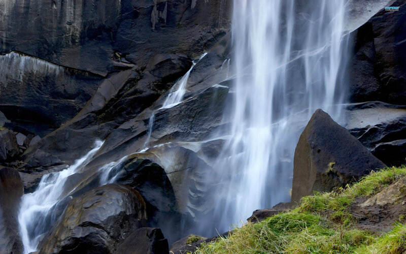 Waterfall on Rocky Cliff — Black, Dramatic