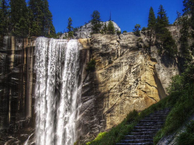 Waterfall on Rocky Cliff — Blue, Dramatic, Afternoon
