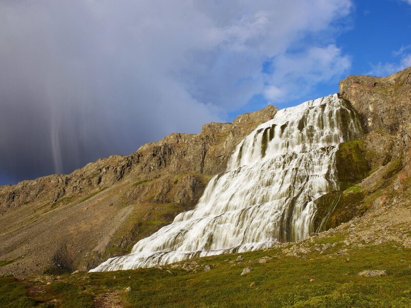 Waterfall on Rocky Cliff — Blue, Dramatic
