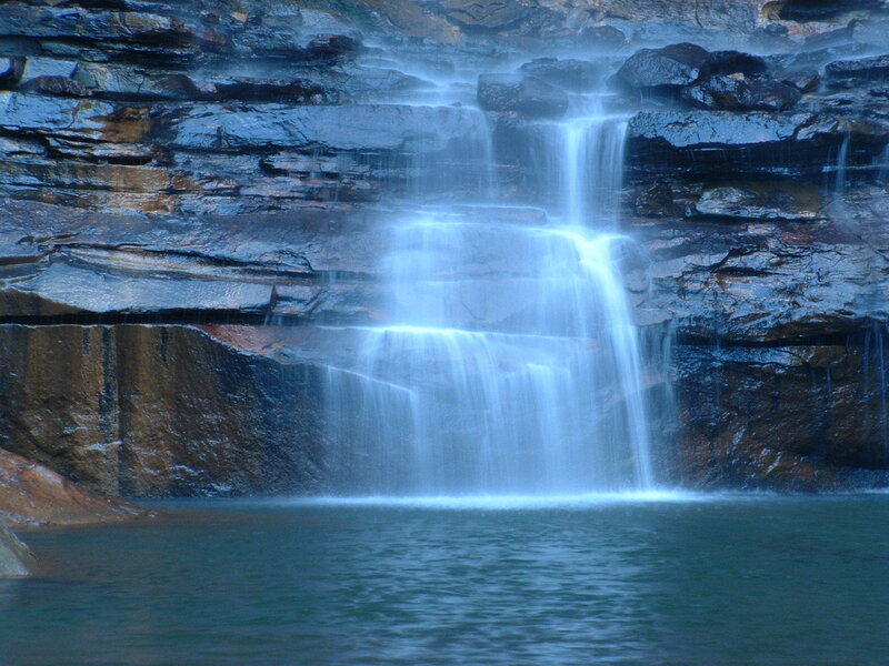 Waterfall on Rocky Cliff — Blue, Serene, Photograph, Rock
